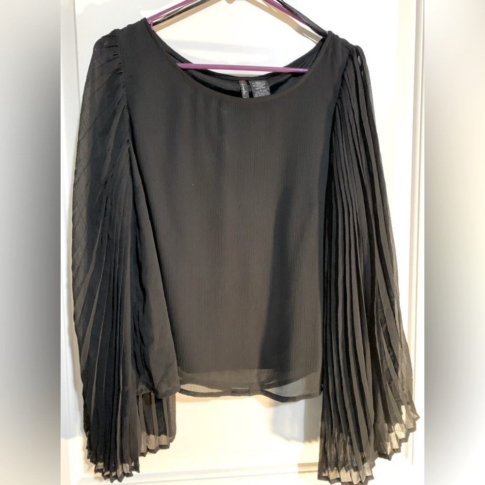 Women’s Black Dress Shirt size Large with Flowy see thru sleeve.